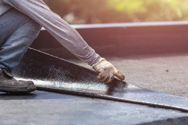 Professional Basement Waterproofing technician working in Monroe, WA